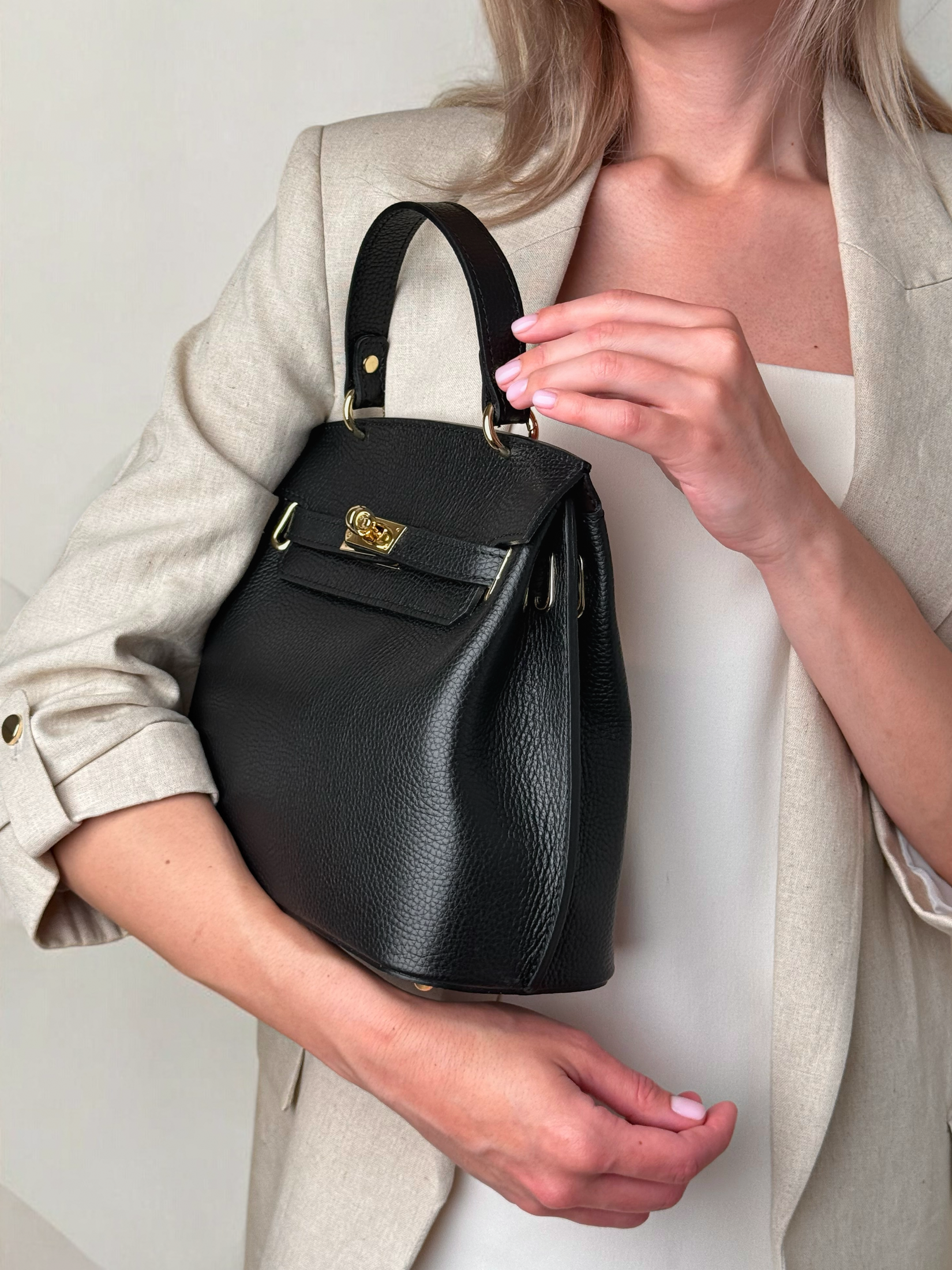 SCHWARZE MIA, ECHTES LEDER.