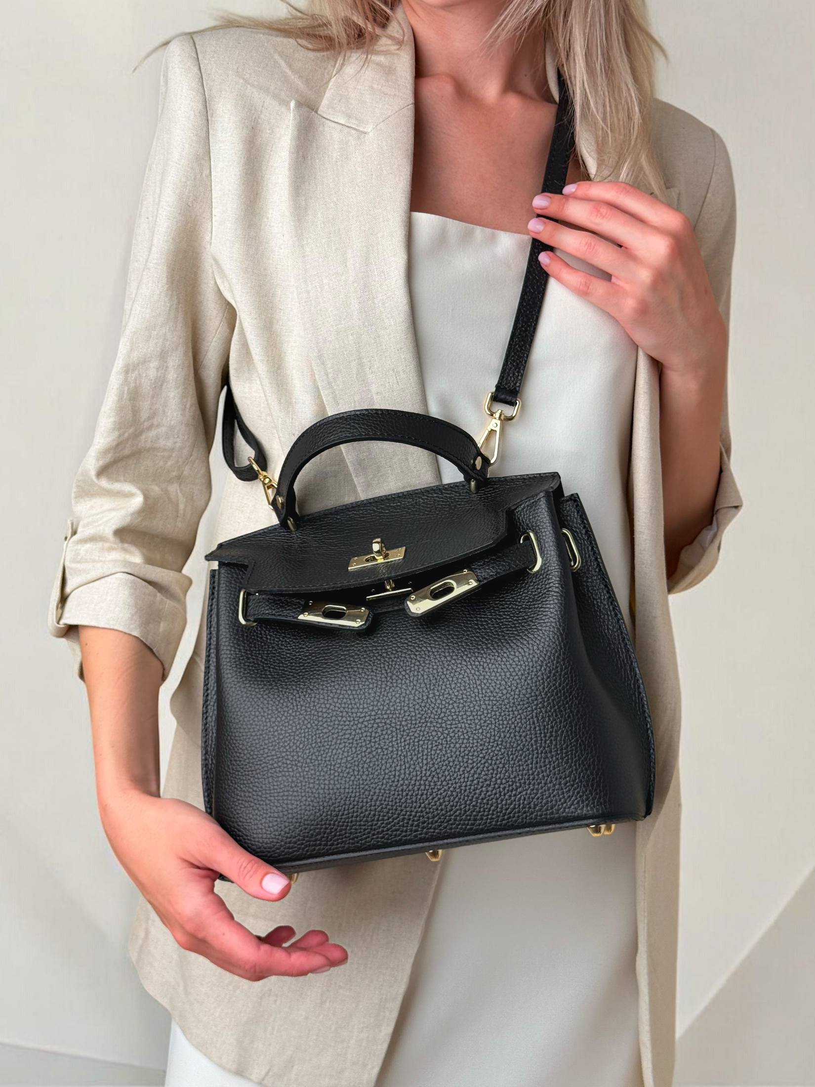 SCHWARZE MIA, ECHTES LEDER.