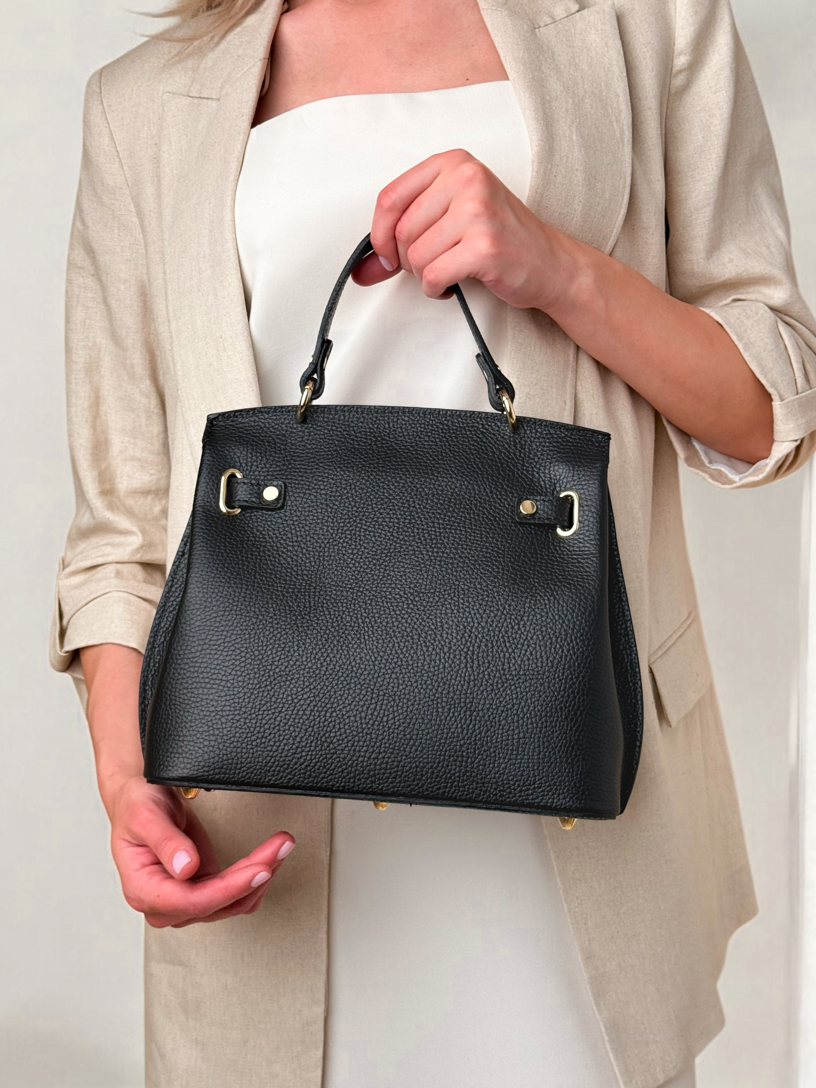 SCHWARZE MIA, ECHTES LEDER.